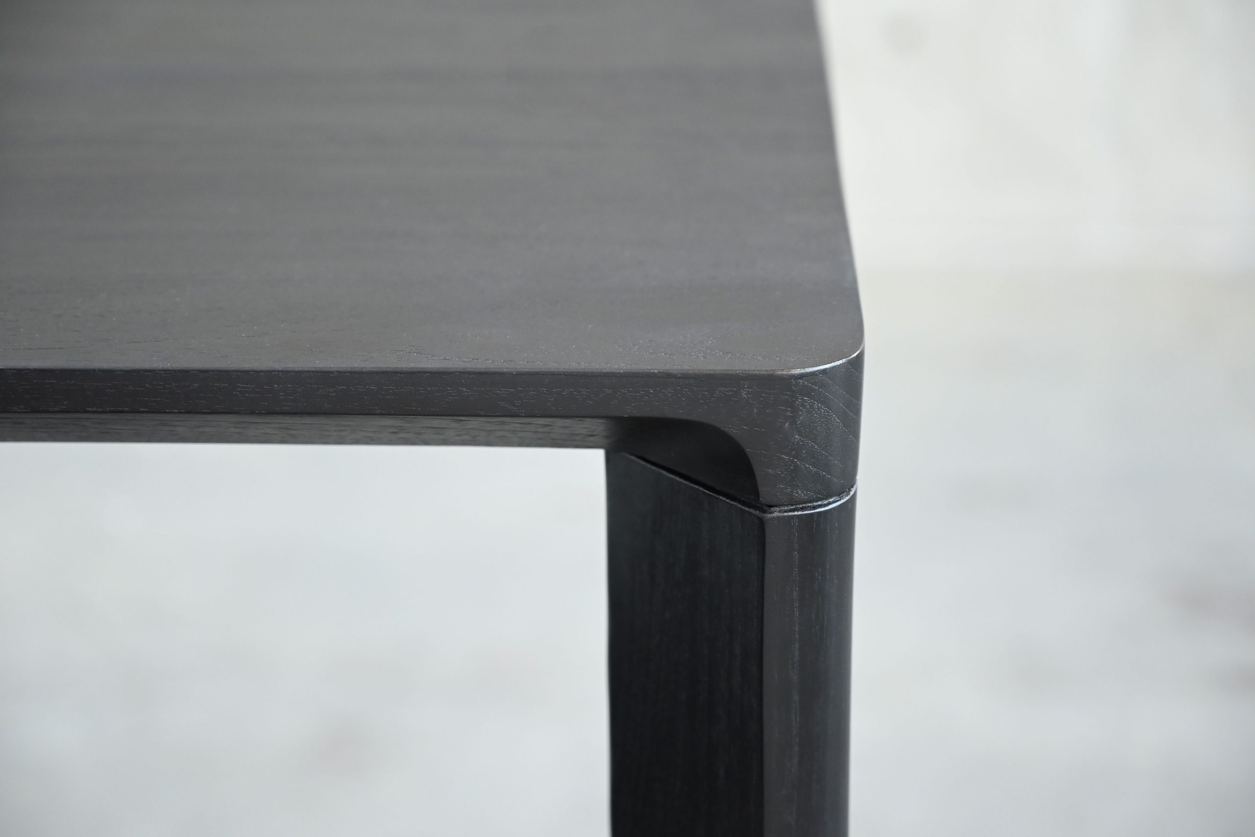 plank black soot solid teak dining table