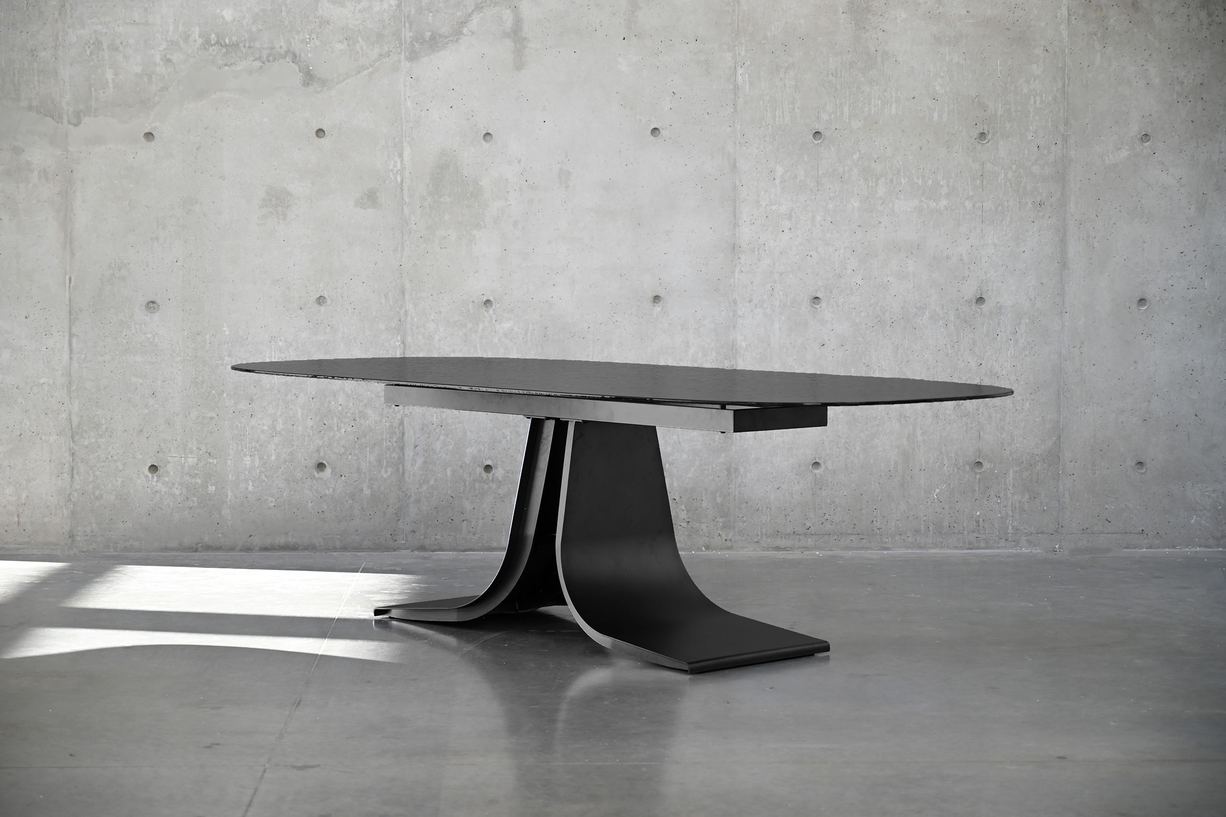 ponza black modern melt glass oval dining table