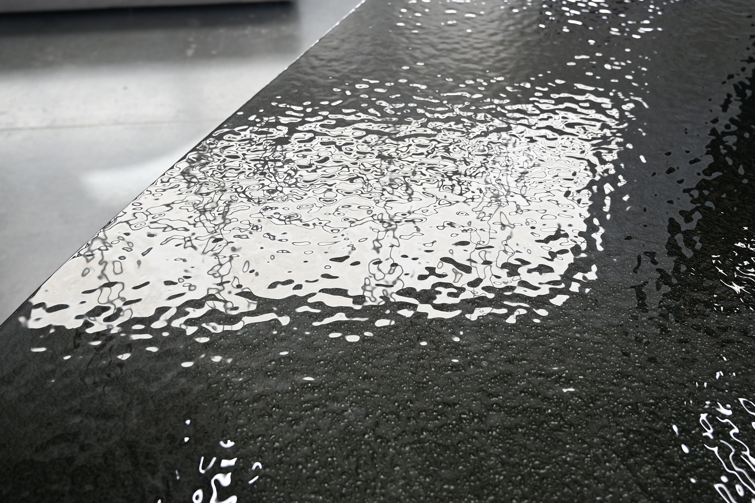 ponza black modern melt glass oval dining table