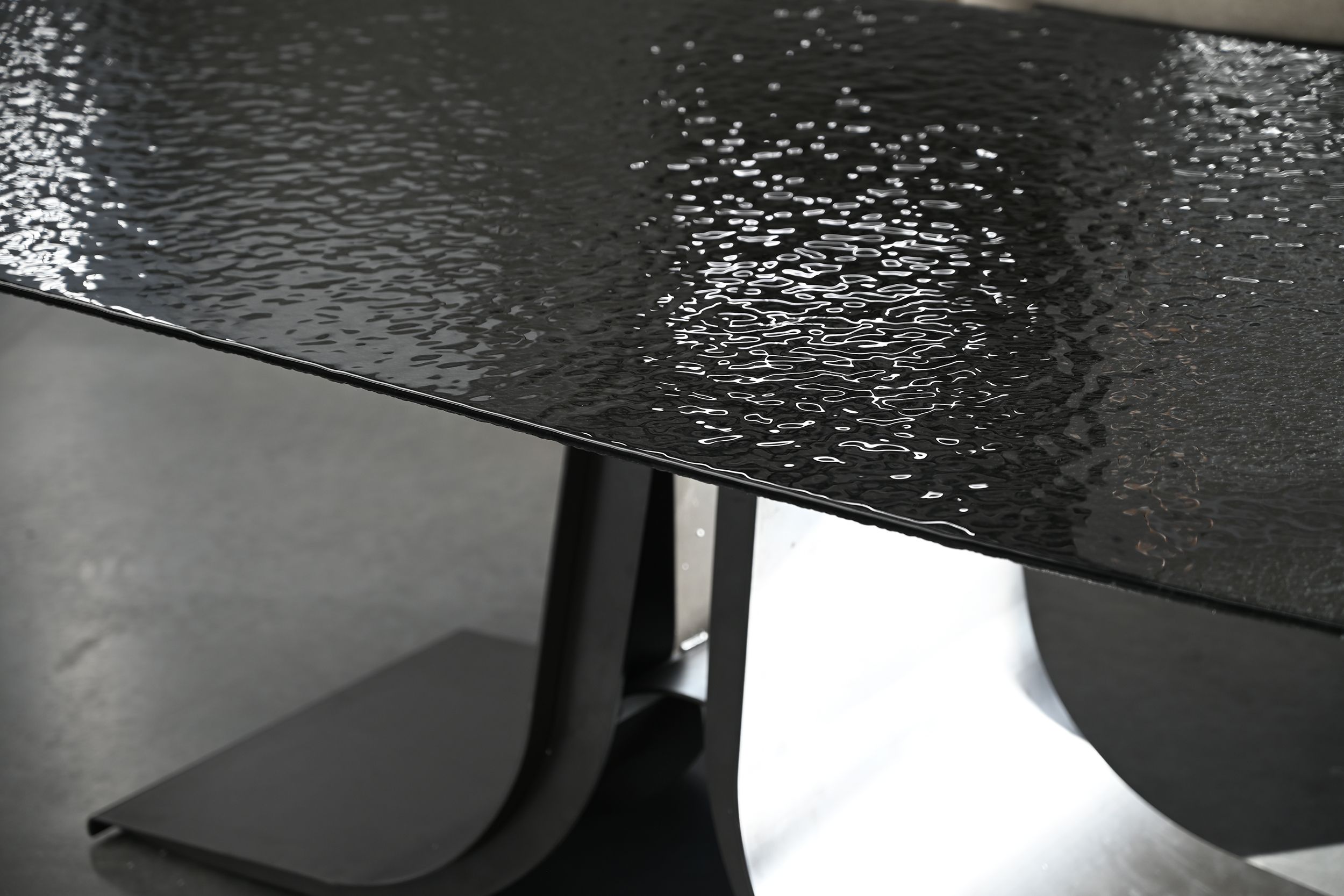 ponza black modern melt glass oval dining table