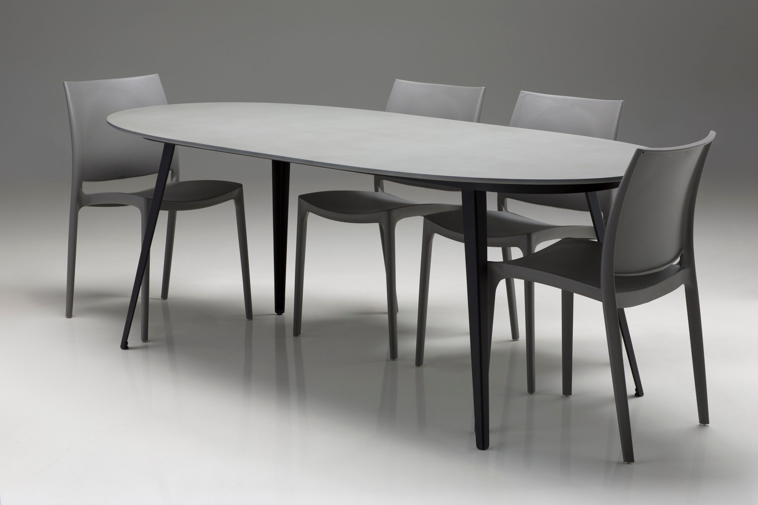 tulum oval grey concrete dining table black steel legs