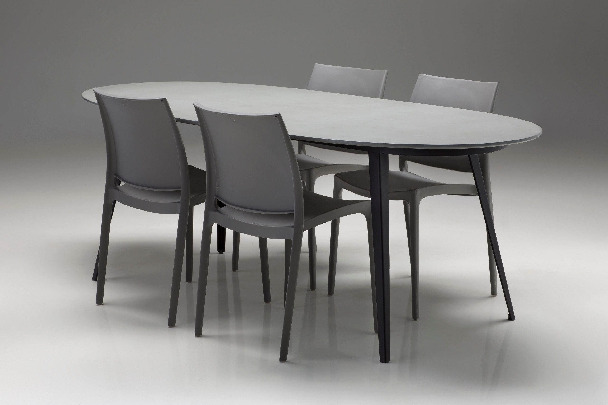 tulum oval grey concrete dining table black steel legs