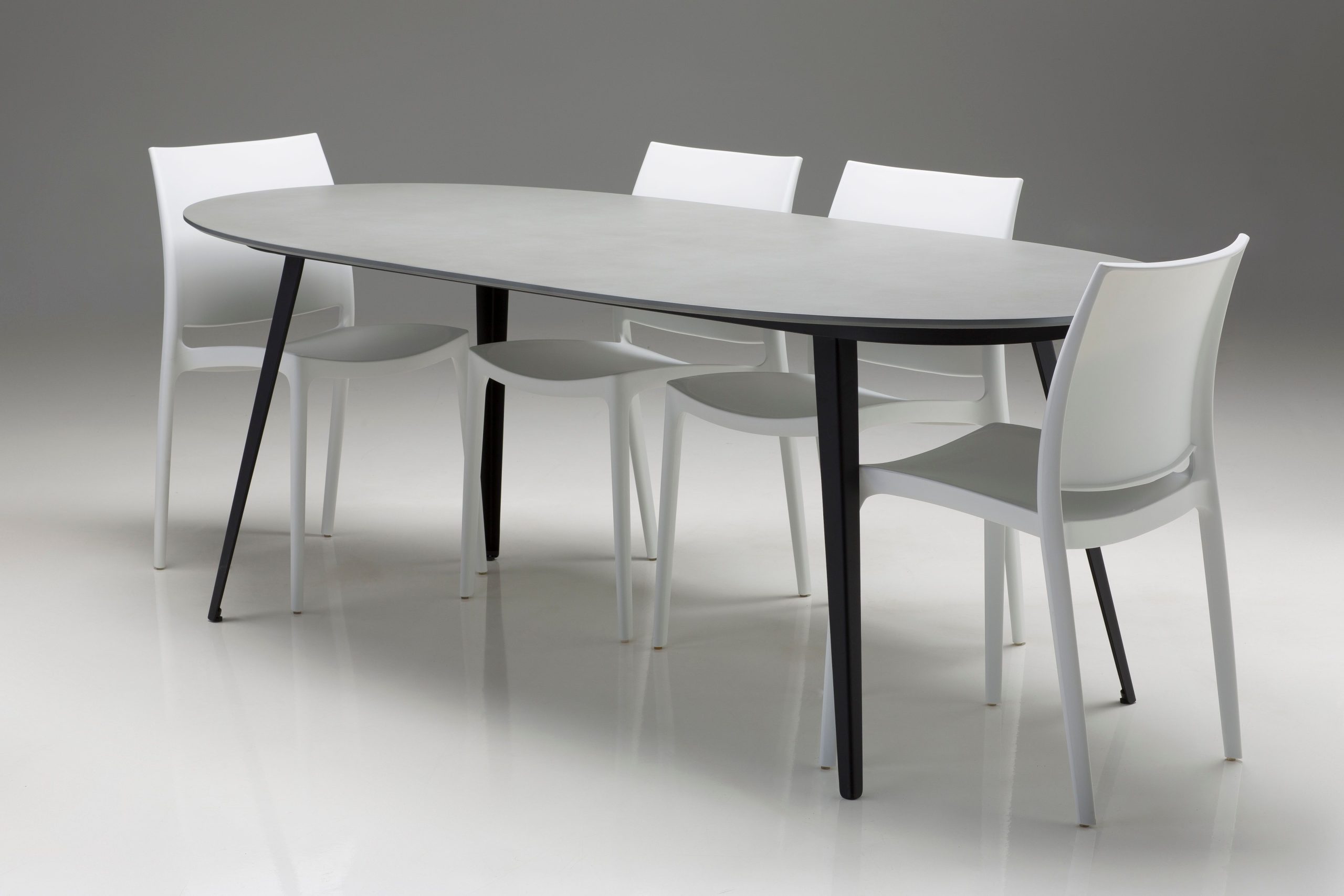 tulum oval grey concrete dining table black steel legs