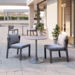 Gray Round Dining Table with Aluminum Frame and Sunburst Design