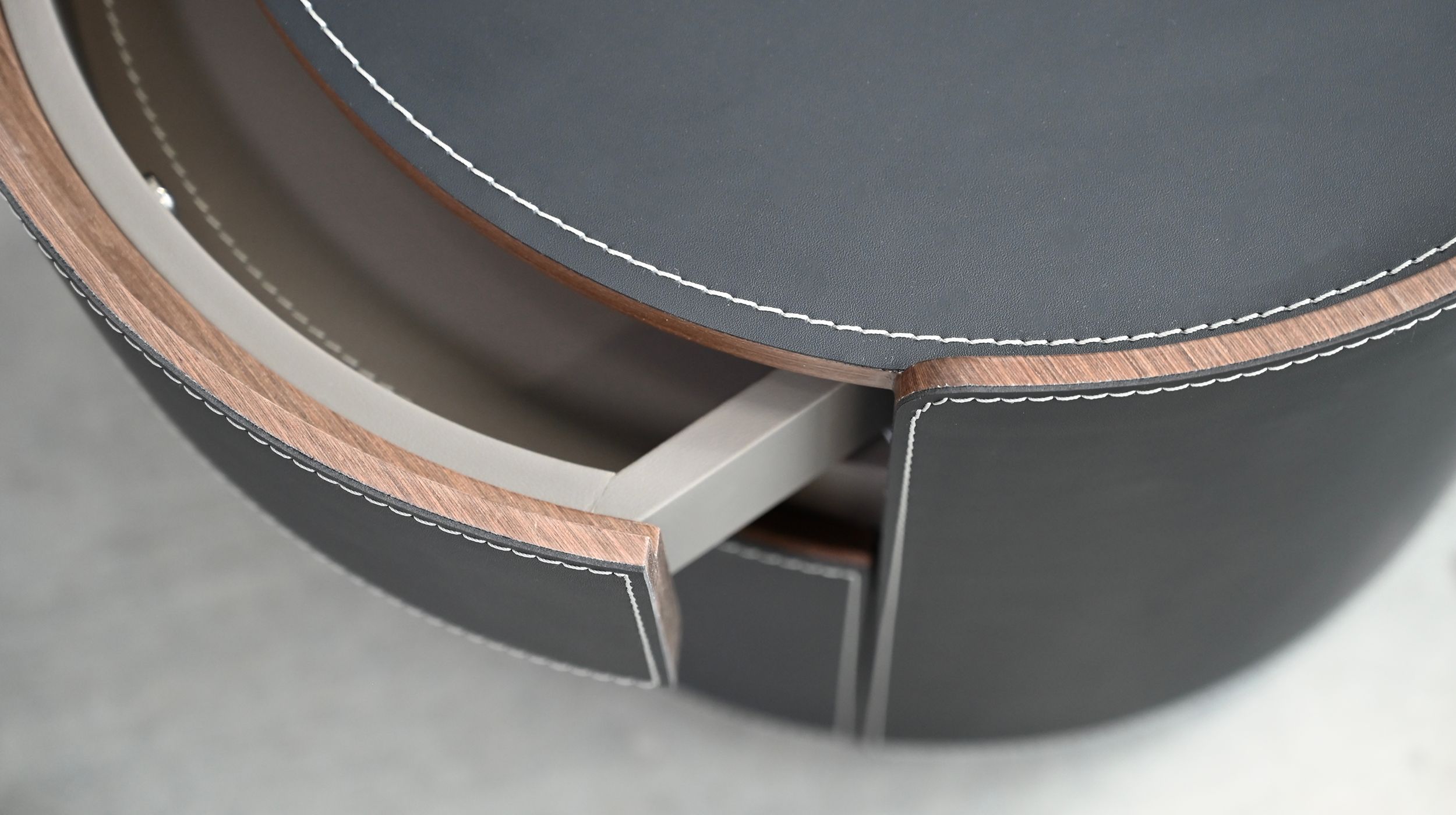 merc black leather round side table with soft closing drawer