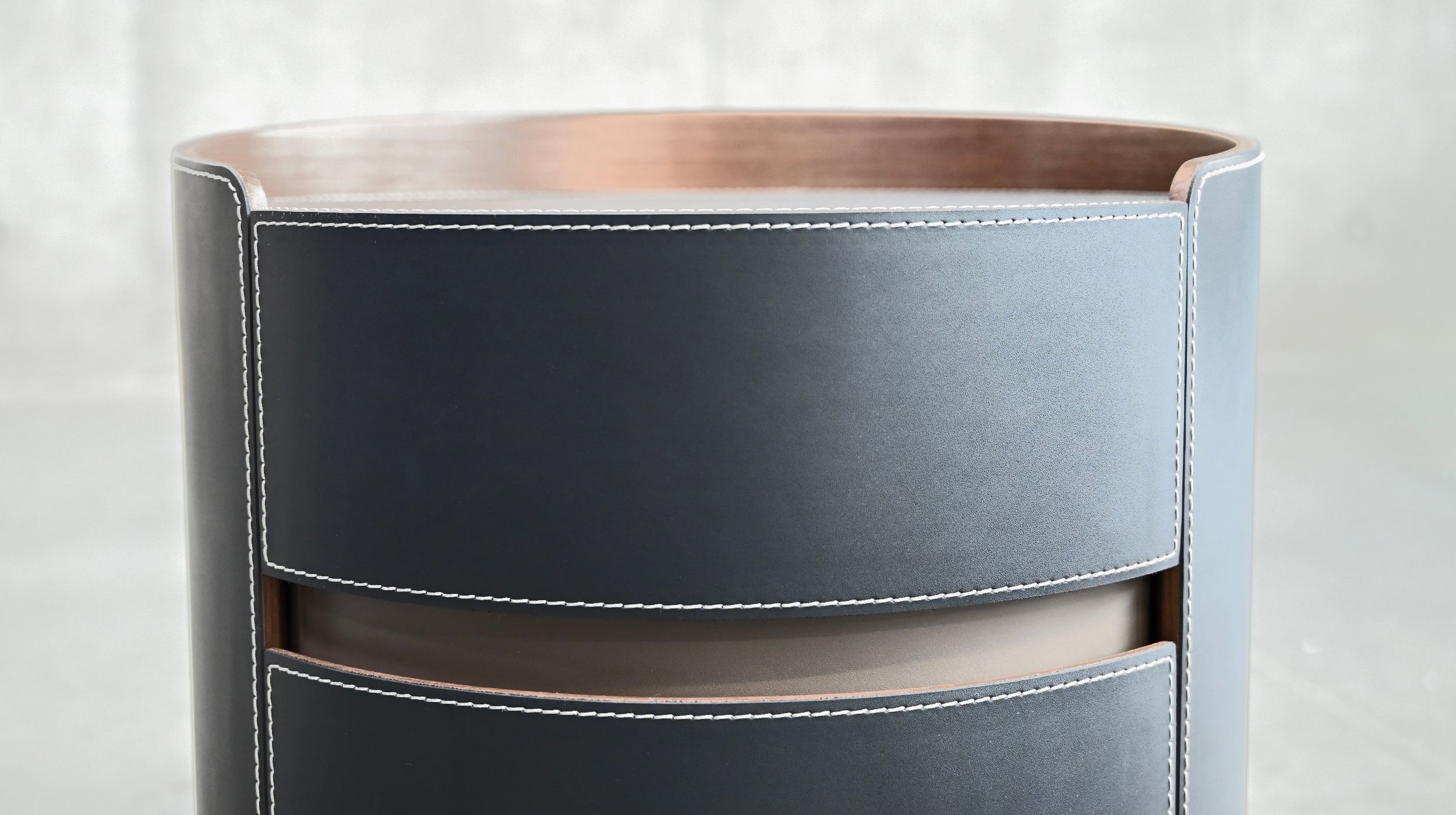 merc black leather round side table with soft closing drawer