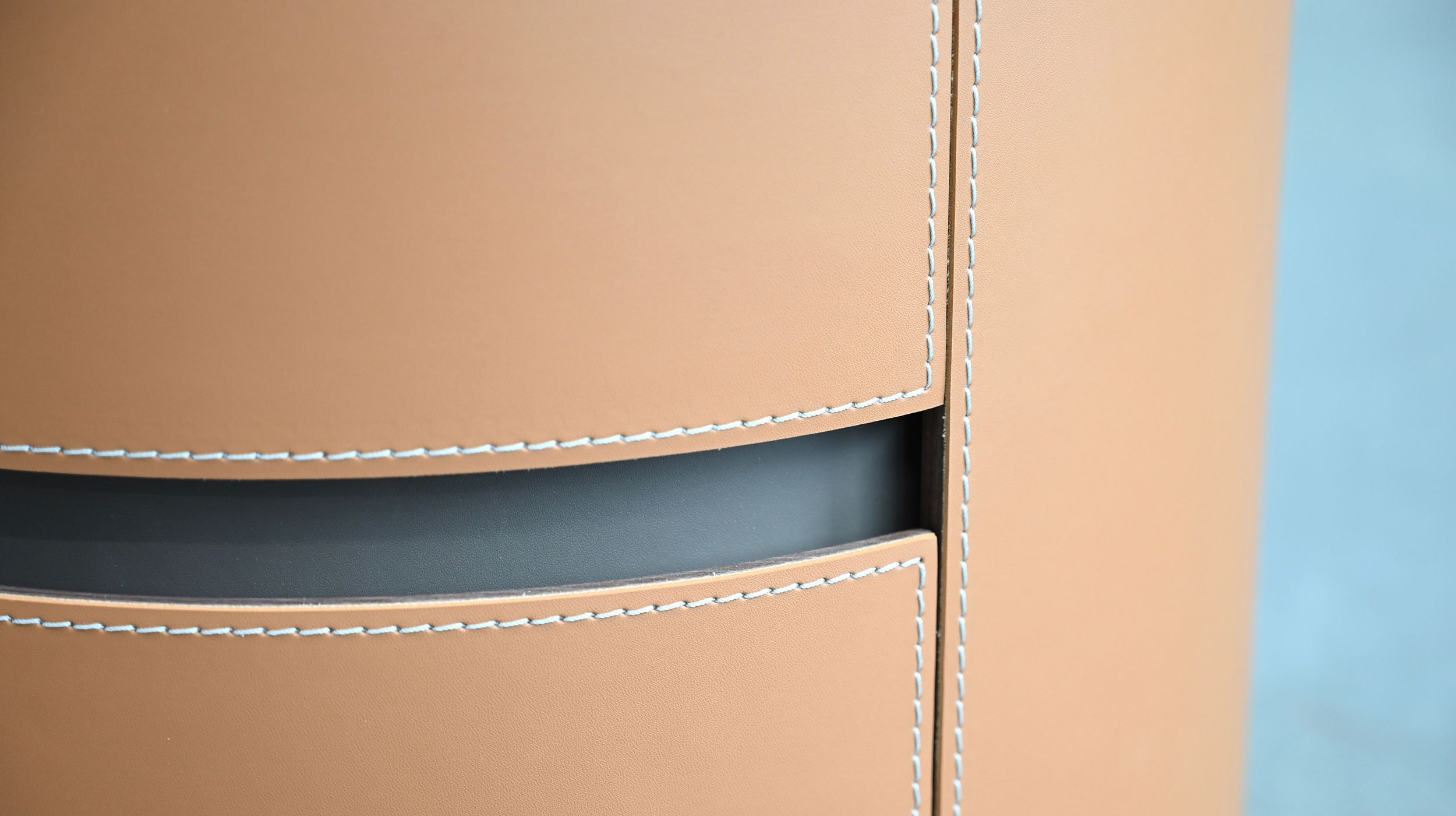 merc tan leather round side table with drawer