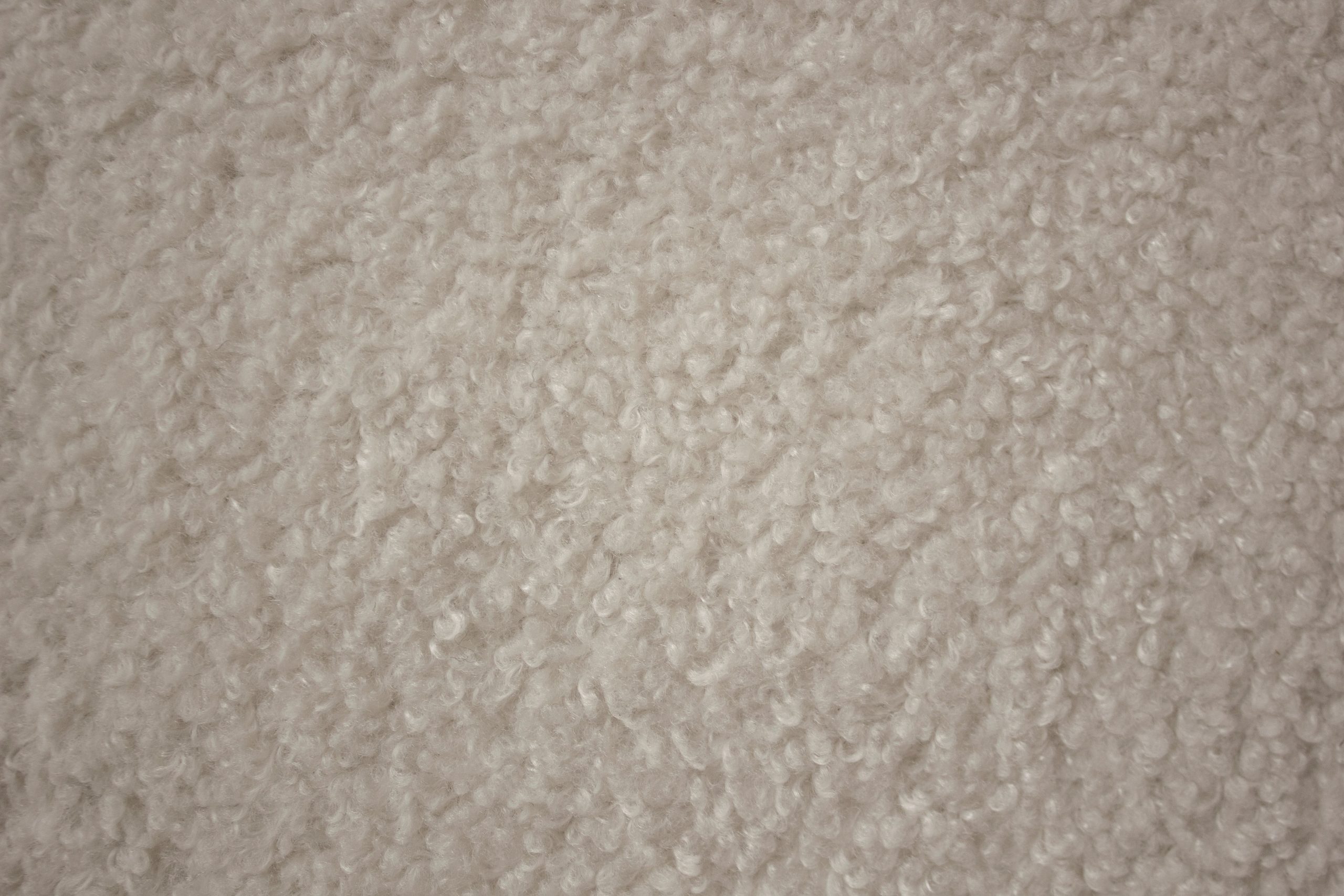 cumulus cream boucle fabric sofa with leather strap